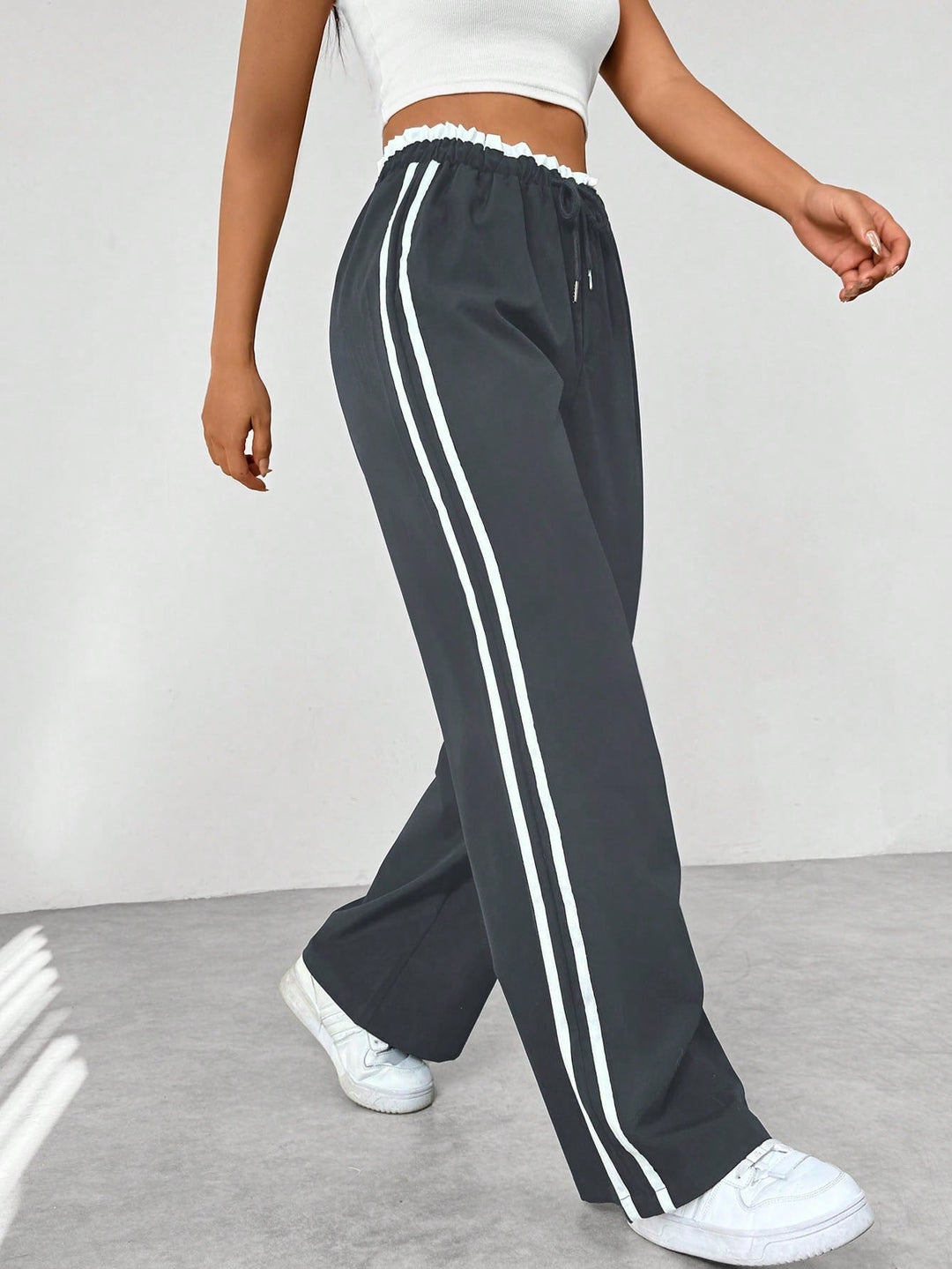 Nyvara | Women’s Wide-Leg Trousers with stripe running along the sides