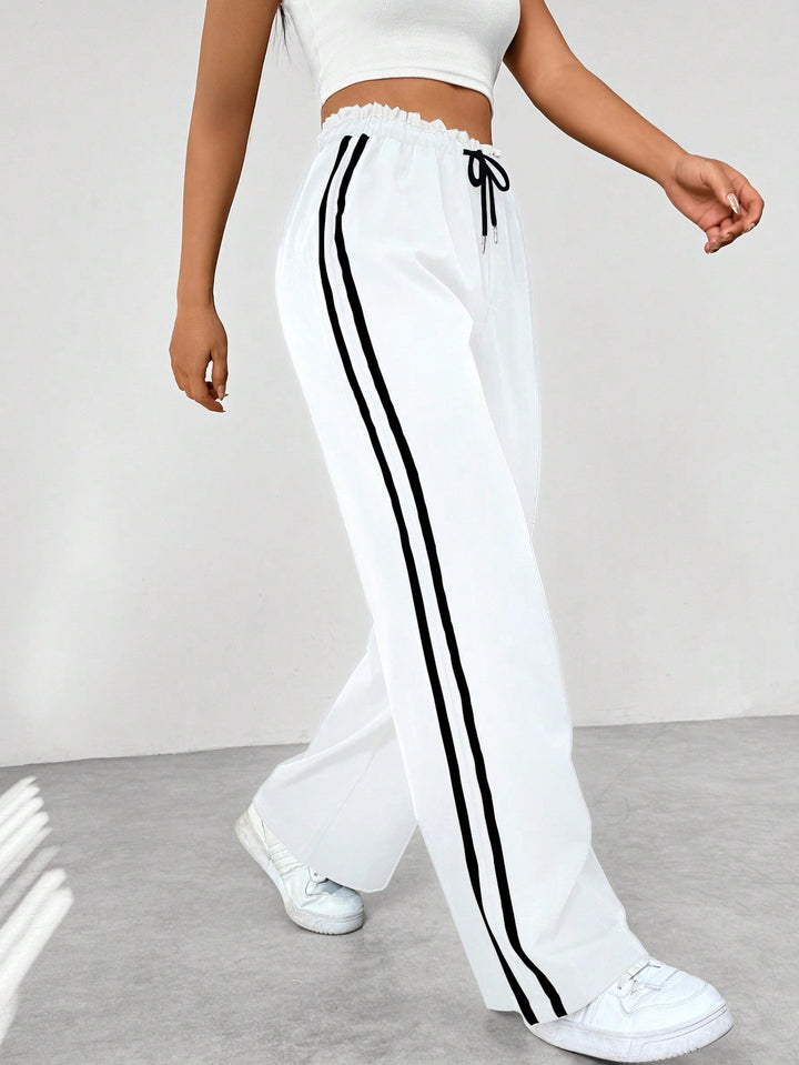 Nyvara | Women’s Wide-Leg Trousers with stripe running along the sides