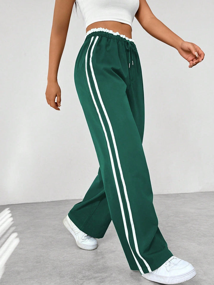 Nyvara | Women’s Wide-Leg Trousers with stripe running along the sides
