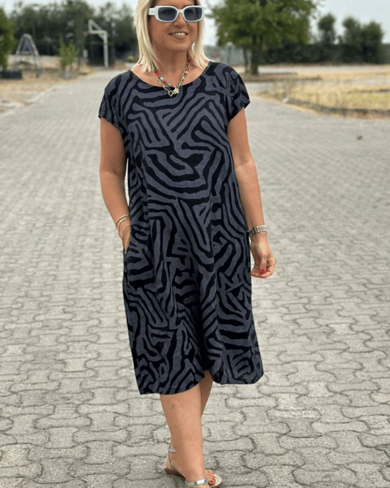 Orlisse | Women’s Printed Midi Dress with loose-cut outline