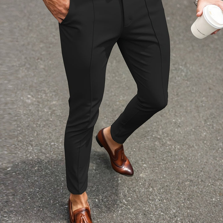 Rovelin | Men’s Tapered Trousers with sleek fit and clean treatment