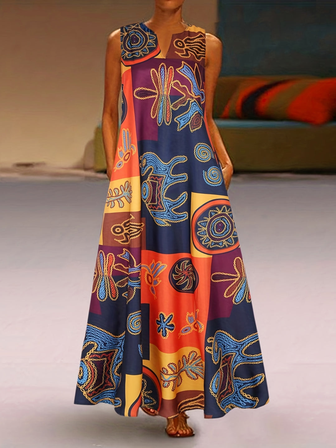 Ervessa | Women’s Sleeveless Maxi Dress with abstract print and flowing figure