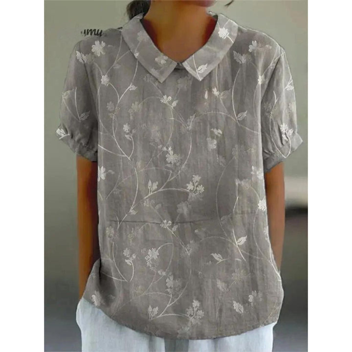 Lioren | Women’s Short Sleeve Blouse featuring floral print