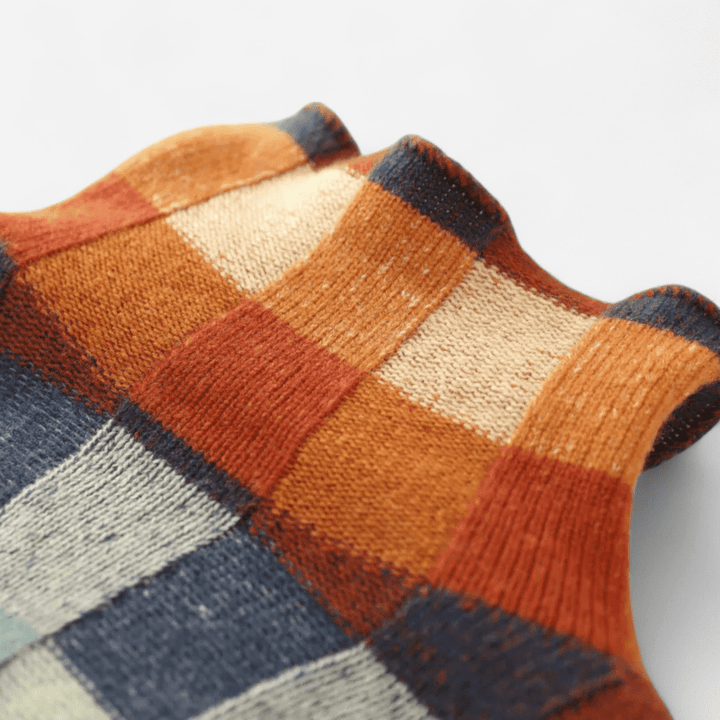 Marisse | Women’s Check Jumper featuring a high neckline