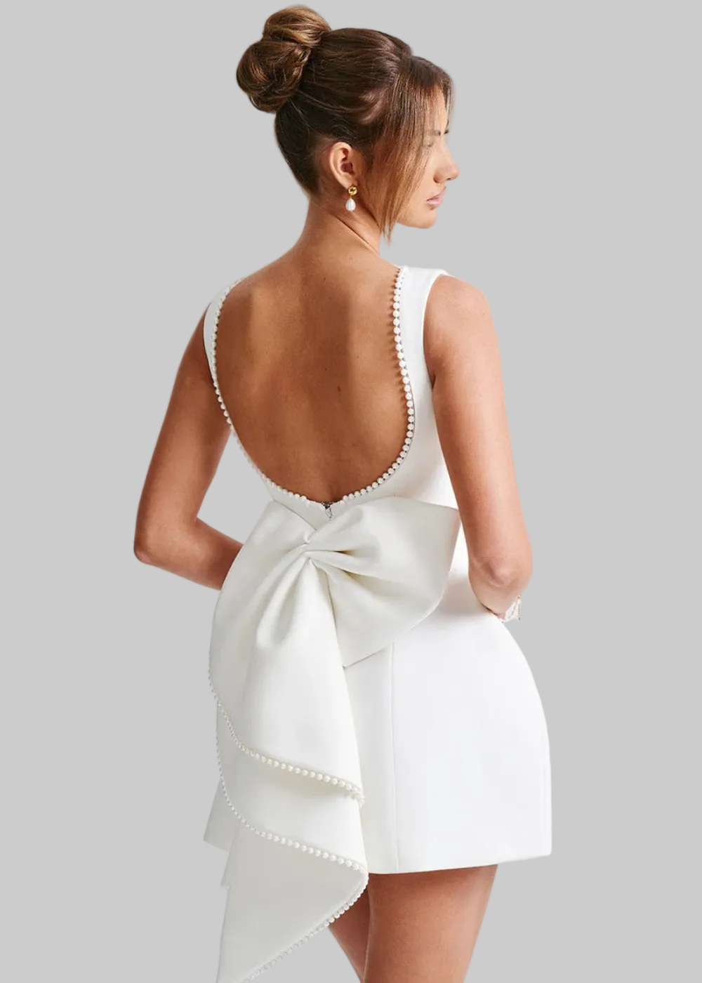 Elara | Women’s Backless Mini Dress with statement bow finish