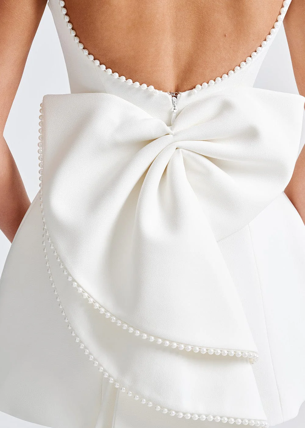 Elara | Women’s Backless Mini Dress with statement bow finish
