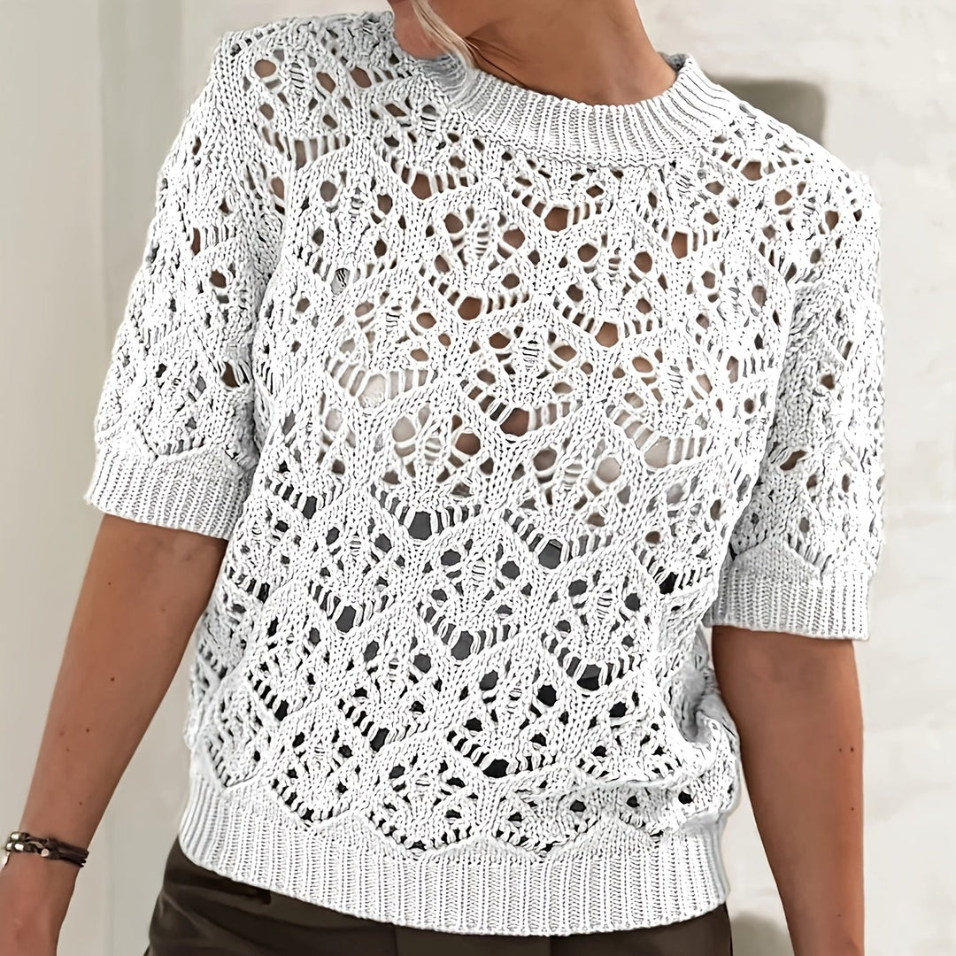 Zerelle | Women’s Short Sleeve Top with subtle open detailing throughout
